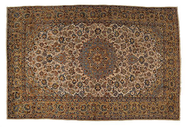 Isfahan Rug : Isfahan Rug Iranian, mid-20th century, having a tan ground with stepped floral borders and spandrels and a field of florals with centeral medallion; 8.5 x 12.5 ft. (254 x 381 cm)