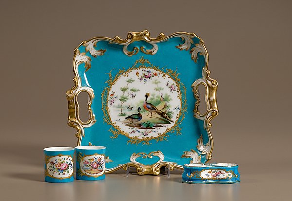 Vincennes Porcelain Tray with Open Salt, Beakers: Continental, 18th century, A large Vincennes soft-paste porcelain handled tray with hand-painted peacocks and mallards, surrounded by decorative gilded floral motifs against a turquoise ground; with a