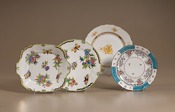 Herend Porcelain Tablewares : Herend Porcelain Tablewares, Hungarian, late 20th century. Four Herend items including a "Queen Victoria" pattern cake plate and dinner plate decorated with colorful butterflies; PLUS a "Chinese Bouqu
