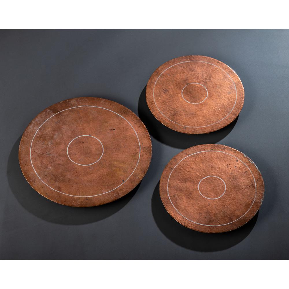 Albert Berry, Three Copper Trivets: Albert Berry American, Early 20th Century Three Copper Trivets hammered copper each marked Berry's Craftshop / Seattle to underside Largest diameter 7 1/2 inches.