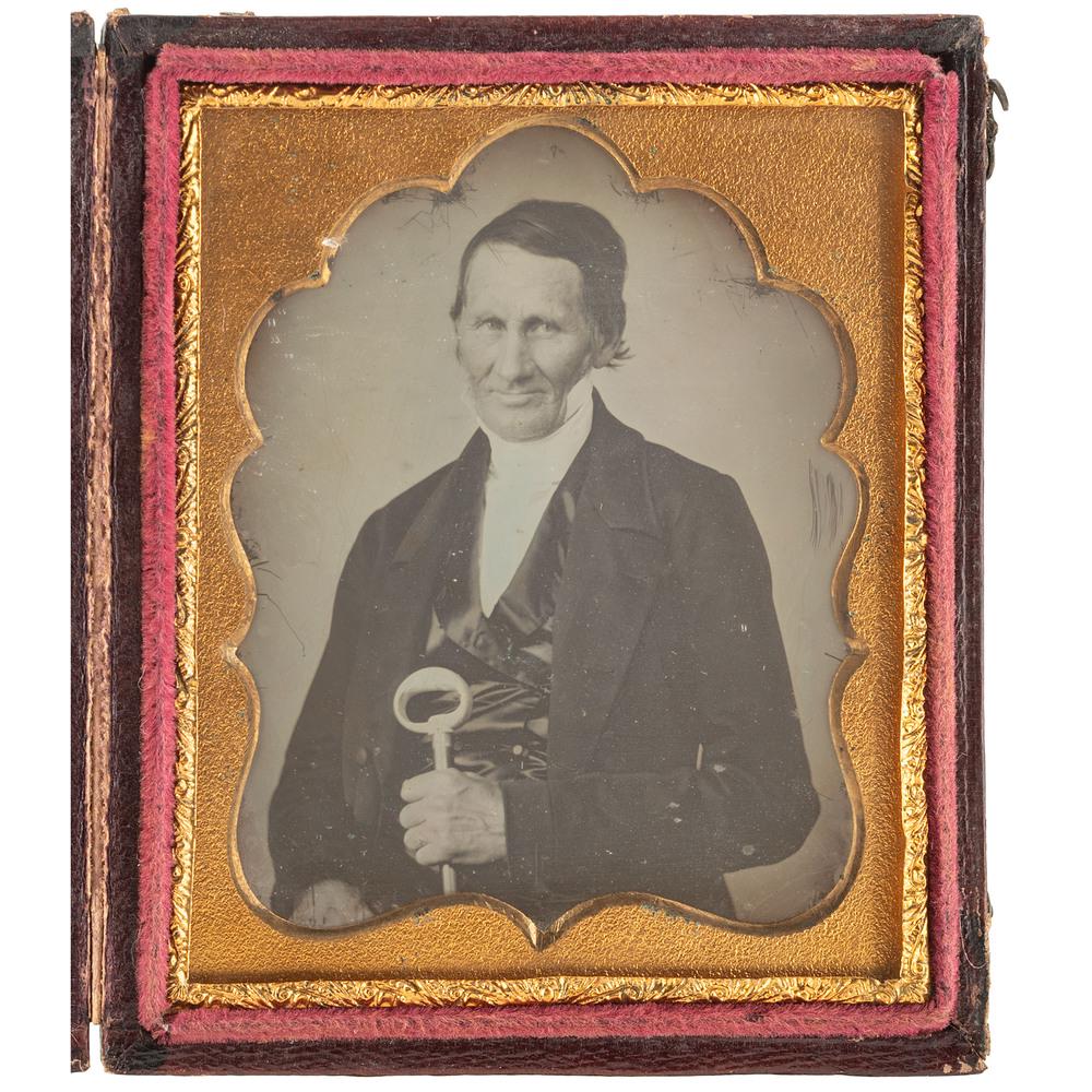 [EARLY PHOTOGRAPHY]. Sixth plate daguerreotype of: Sixth plate daguerreotype. (Few scratches around subject and some spotting to plate, with minor spotting to mat and preserver; resealed.) Housed in full leatherette case (light wear to corners of vel