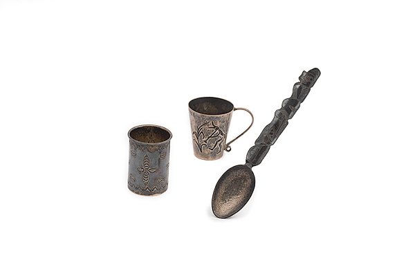 Navajo Silver Shot Glasses and Northwest Coast Spo: Navajo Silver Shot Glasses and Northwest Coast Spoon Lot of 3, includes one tumbler with UITA (United Indian Traders Association) mark and tumbler with ornate Navajo stamping, height 2 in. x diamete