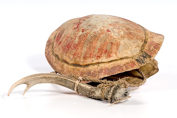 Turtle Shell Drum and Antler : Turtle Shell Drum and Antler shell with red paint on top and underside, length 10.5 in.; antler length 8 in. mid 20th century