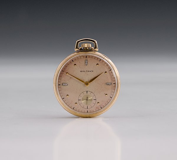 Waltham 14K Gold Open Faced Pocket Watch : Waltham 14K Gold Open Faced Pocket Watch American, ca 1930. An open faced pocket watch, "Colonial" model; stem wind and set; 21 jewel; adjusted size 14; diamond set dial; marked Waltham on face; dia