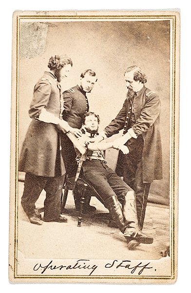 CDV of 165th OVI Operating Staff : CDV of 165th OVI Operating Staff Having back mark of "D.P. Barr, Paducah," ink signed on verso, "Complements of Solomon Wolff/Surg(eon) & Med. Dir." with remnants of revenue stamp, now missing. An a