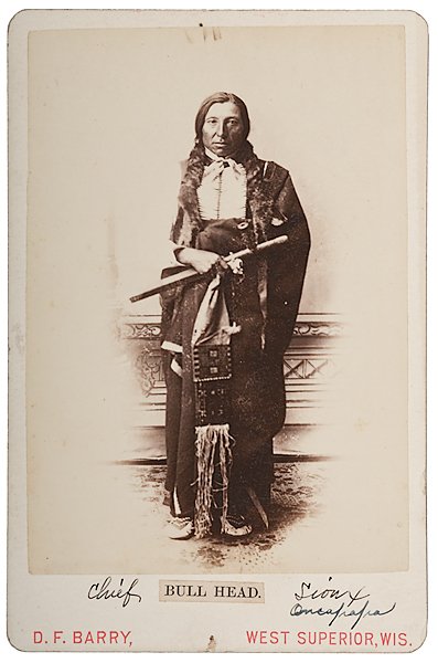 D.F. Barry Cabinet Card of Bull Head : D.F. Barry Cabinet Card of Bull Head Hunkpapa Sioux, 4.25 x 6.5 in. Ink notation and applied printed caption on mount identify subject and tribe; imprint identifies Barry's West Superior, Wisconsin 