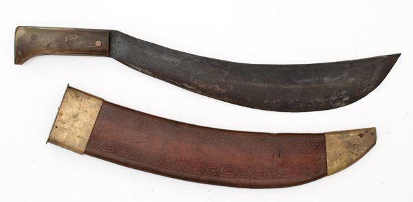 WWI Philippine Insurrection Bolo Machete : WWI Philippine Insurrection Bolo Machete 15.75" massive iron blade with tooled leather scabbard with brass fittings. Green horn handle.