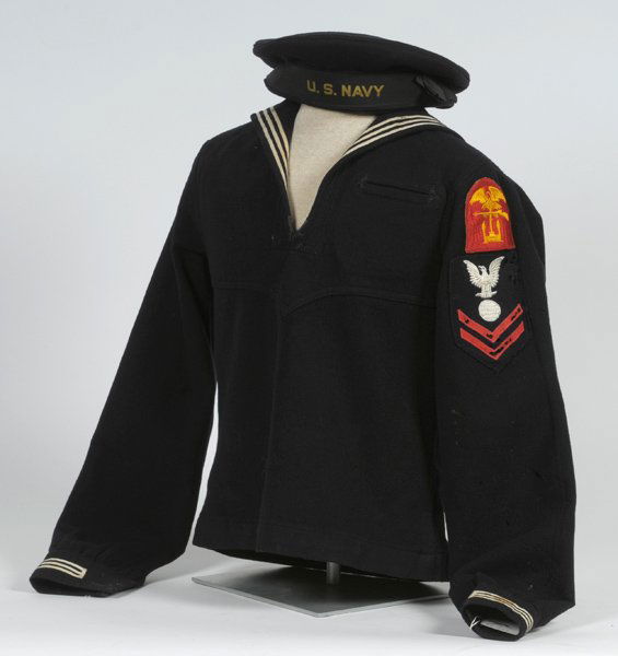 WWII U.S. Navy Enlisted Man's Uniform with Cap: WWII U.S. Navy Enlisted Man's Uniform with "Donald Duck" Cap Tunic, pants, cap, navigator 2nd class, amphibious landing forces patch; and half mannequin.