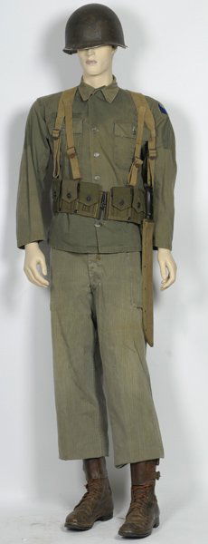 WWII U.S. Army Combat Uniform and Accouterments: WWII U.S. Army Combat Uniform and Accouterments on Full Mannequin Herringbone twill fatigue jacket & pants, 3 buckle boots, field gear including 10-pocket ammo belt, Y-straps, backpack, shovel, mach