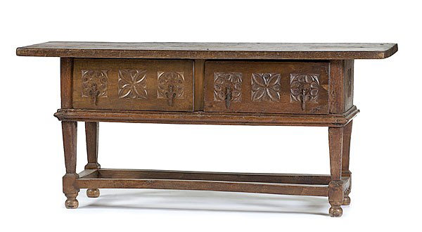 Spanish Stretcher Base Table : Spanish Stretcher Base Table Spanish, 18th century. Single-board top above four tapered legs with mortise-and-tenon stretcher base, two dovetailed drawers, with facings of carved rosettes, hand-wrou