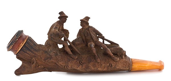 Black Forest Carved Pipe : Black Forest Carved Pipe Continental, late 19th century. A finely carved Black Forest pipe. Depicting two seated men in an outdoor setting, one with hunting rifle and dog, the other with hiking stic