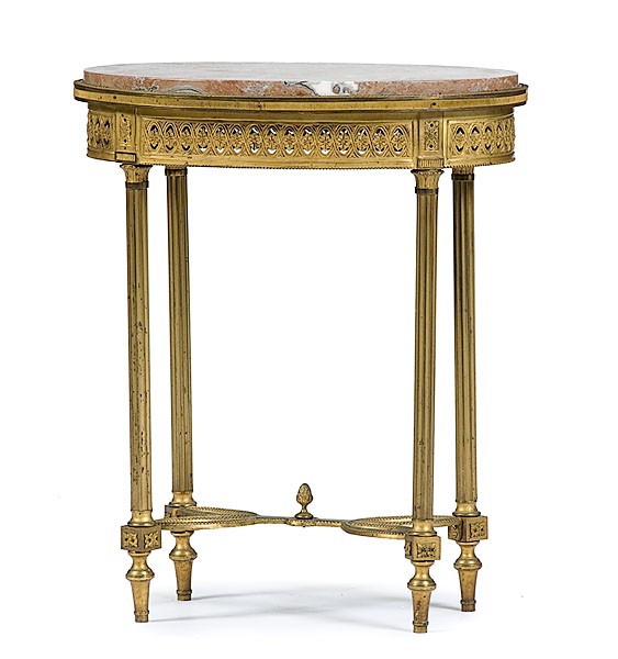 Louis XVI-style Gueridon Table : Louis XVI-style Gueridon Table French, late 19th century. A gilt bronze and marble gueridon table in the Louis XVI-style with fleur de peche marble top, a pierced gilt bronze frieze and fluted colum