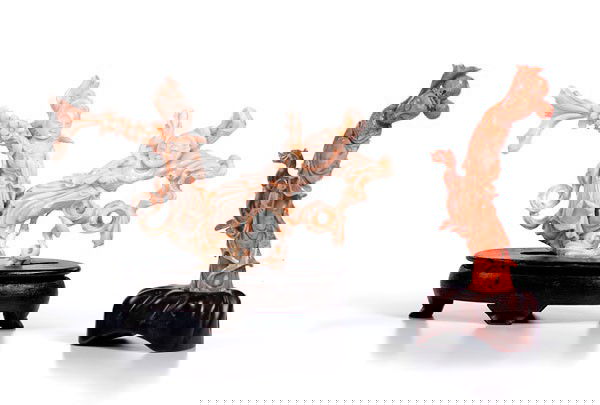 Chinese Carved Coral Figurines : Chinese Carved Coral Figurines Chinese, 19th century, a carved coral Quanyin figure in carved coral with long robes, mounted on a rosewood base; ht. 6.5 in. And a carved coral of two Asian figures l