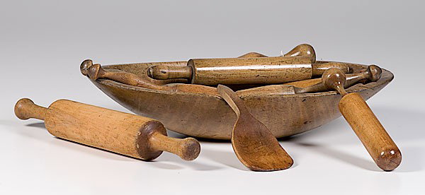 Wooden Trencher and Group of Wooden Tools : Wooden Trencher and Group of Wooden Tools lot of 14; large elongated eliptical shaped trench with wooden tools, such as rolling pins, pestles, scrapers and spoons; trencher measures 22 1/2 x 4 1/2 i