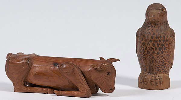 Folk Art Carved Bull and Eagle : Folk Art Carved Bull and Eagle American, early 20th century, of pine. A folk art carved recumbent bull with black glass, bead eyes, purported to be from WPA project in New Mexico; lg. 11.5 in. Also,