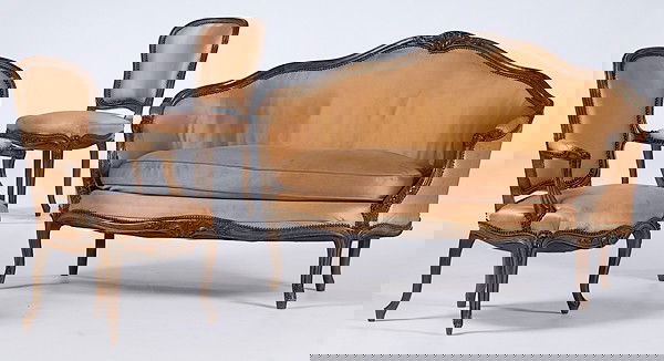 French Louis XV-style Suite : French Louis XV-style Suite American, ca 1930-1950, a suite of three pieces, all with carved seat rails, a canape, fauteuil and chaise, all upholstered in a pale pink satin; fauteuil and chaise, oah