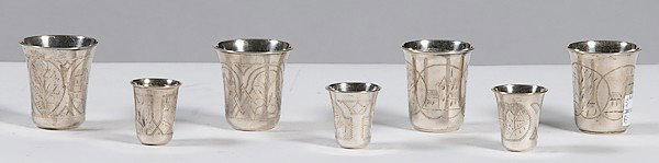 Russian Silver Beakers : Russian Silver Beakers ca 1894-1897, a lot of seven Russian sterling Vodka beakers, each having engraved scenic design of buildings and flowers, silversmith hallmarks, city mark Kiev/Ukraine; talles
