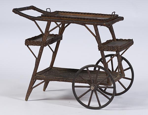 Wicker Tea Cart : Wicker Tea Cart American, early 20th century. Wicker tea cart with top removable tray, two side shelves and a lower shelf; ht. 28, wd. 35, dp. 17.25 in.