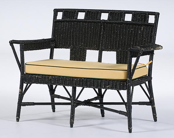 Wicker Settee : Wicker Settee Late 19th century wicker settee, painted black with upholstered cushion; ht. 35, wd. 48.5, dp. 21 in.