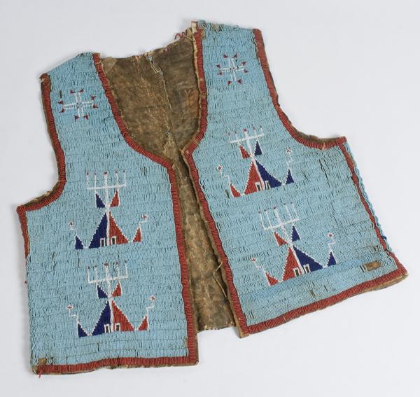 Sioux Beaded Hide Vest : Sioux Beaded Hide Vest Sinew-sewn using bead colors of light blue, red white-heart, dark blue, and white, length 21 in. x chest 41 in.; late 19th century.