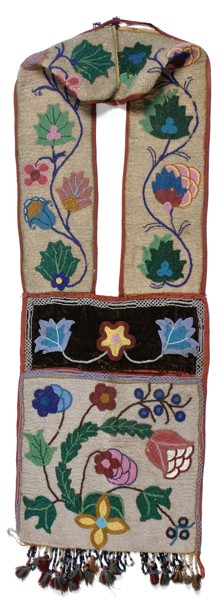 Chippewa Beaded Bandolier Bag : Chippewa Beaded Bandolier Bag Thread-sewn with typical floral designs using a variety of bead colors; wool pompoms and bugle beads finish bag, length 40 in. x 13 in.; late 19th century.