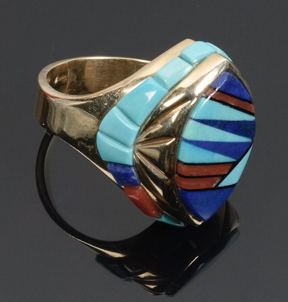 Zuni 14k Gold Ring with Multi-Stone Inlay: Zuni 14k Gold Ring with Multi-Stone Inlay Comprised of coral, turquoise, and lapis set in complex geometric arrangement and marked with unknown picture motif, size 5.5. fourth quarter 20th century
