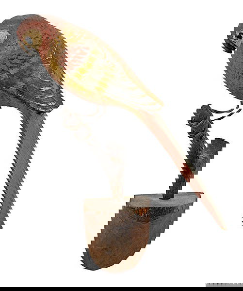 Painted Parrot Folk Art : Painted Parrot Folk Art American, early 20th century, a wall mounted carved and painted parrot folk art with wire legs, and perched on a branch; ht. 13 in.