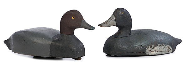 Duck Decoys : Duck Decoys Michigan, 20th century. Two duck decoys with original paint, the first with gray body, painted yellow eyes; lg. 14.5 in. Second attributed to Christopher Columbus Smith, (Chris Craft), w