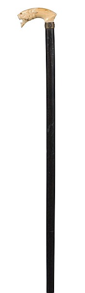 Carved Ivory Handle Cane : Carved Ivory Handle Cane Ca 1900,"L" shaped cane handle with carved ivory mountain lion, fleur-de-lis-decorated collar, mounted on a tapered wooden shaft with 1.25 in. brass ferrule; lg. 37.5 in.