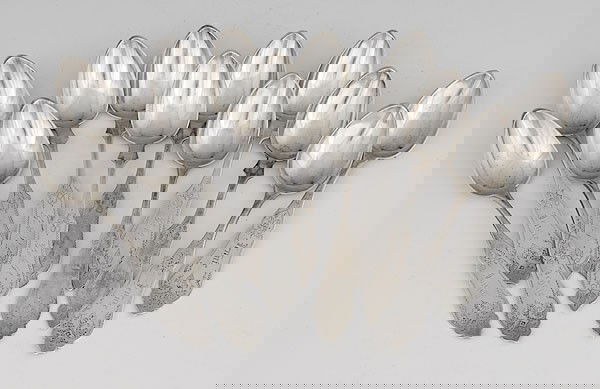 Coin Silver "Fancy" Duhme & Co. Spoons : Coin Silver "Fancy" Duhme & Co. Spoons Cincinnati, ca 1860-1870, an assembled set of twelve Duhme & Co. teaspoons, six with fins and wriggle work, six with similar decoration, minus fins, engraved;