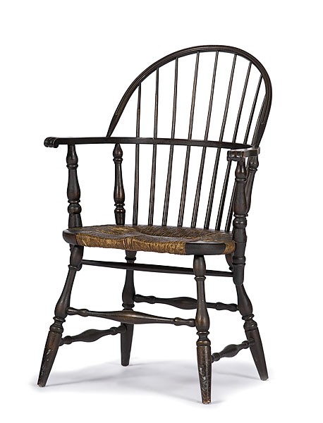 Sack- Back Windsor Armchair : Sack- Back Windsor Armchair American, early 20th century, a sack-back Windsor chair, turned legs and stretchers with rush seat, original old varnished finish; sht. 17.5, oht. 38 in.