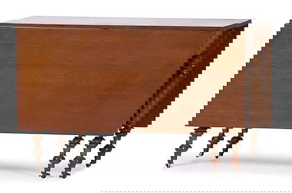 Cherry Drop-leaf Dining Table : Cherry Drop-leaf Dining Table Possibly Western Pennsylvania, ca 1820, a cherry drop-leaf dining table with six turned and tapering legs on casters, one board top and leaves, barrel-jointed leaves wi