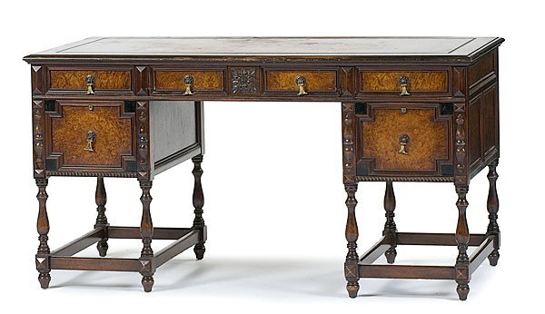 Robert Mitchell Partner's Desk : Robert Mitchell Partner's Desk Cincinnati, Ohio, ca 1900-1910. A Elizabethan-style desk, labeled The Robert Mitchell Furniture Company/Cincinnati, Ohio, with center long drawer flanked by drawers tw