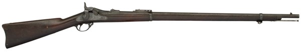 U.S. Model 1884 Trapdoor Springfield Rifle : U.S. Model 1884 Trapdoor Springfield Rifle .45-70 caliber, 32.5" round barrel with large VP and eagle proof marks. S/N 454611. Walnut stock with two barrel bands.