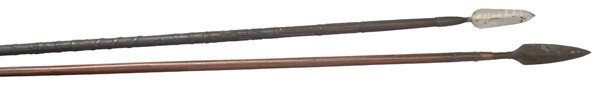 Philippines 19th Century Tribal Spears, Lot of Two: Philippines 19th Century Tribal Spears, Lot of Two 1) 10.25" iron spear head on elaborately carved wooden haft depicting a native standing, a coiled snake, tribal masks, and geometric carvings, 62" 