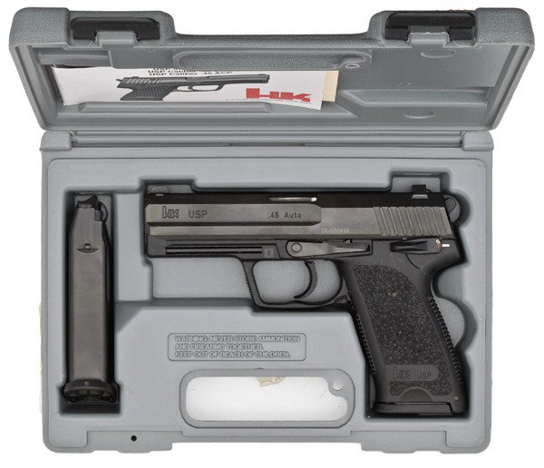 *H&K Model USP Pistol : *H&K Model USP Pistol .45 ACP cal., 4.25" barrel, S/N 25-020439. Two 12 rd. magazines, manual.
