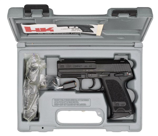 *H&K Model USP Compact Pistol : *H&K Model USP Compact Pistol .357 Sig cal., 3.5" barrel, S/N 111-000484. Matte black finish, two 10 rd. magazines, manual.