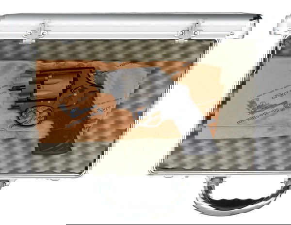 *Smith & Wesson Performance Center Model 327 Revo: *Smith & Wesson Performance Center Model 327 Revolver .357 cal., 2" barrel, S/N DCF8836, scandium, Crimson Trace laser grip.