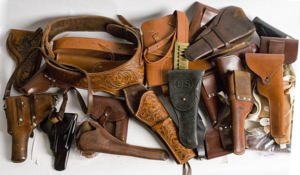 Vintage Lot of Twenty Four Leather Holsters : Vintage Lot of Twenty Four Leather Holsters Holsters for Walther PP, Colt SAA, Sig P210, Makarov, etc.
