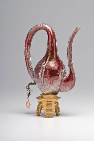 Adrian Saxe, Untitled Mystery or "Puzzle" Porcelain: Adrian Saxe, Untitled Mystery or "Puzzle" Porcelain Ewer (Born 1943, USA) Untitled Mystery or Puzzle Ewer, 1997 Porcelain; ht. 14, wd. 8 in. This is another example of Saxe's surface mastery, a magn