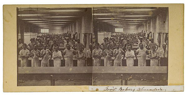 Alexander Gardner Stereoview of Gov't Bakery, Alexa: Alexander Gardner Stereoview of Gov't Bakery, Alexandria On a pale yellow square-cornered mount with applied manuscript label on recto inked Gov't Bakery, Alexandria and pencil inscription on verso