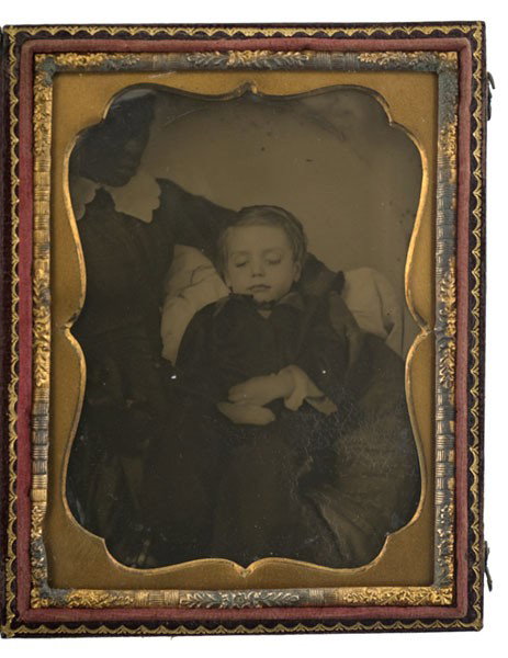 Quarter Plate Ambrotype of a Post-Mortem Child wit: Quarter Plate Ambrotype of a Post-Mortem Child with African American Nanny A portrait of an African American nanny cradling a young, peaceful-looking Caucasian boy in her arms, most likely post-mort