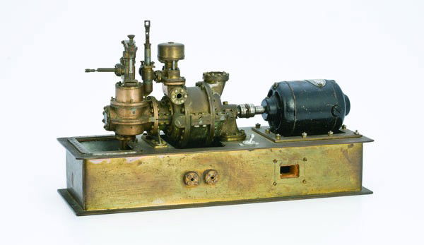 General Electric Small Scale Model of a Turbine En: General Electric Small Scale Model of a Turbine Engine A two-stage type-F working model of a General Electric turbine, produced in 1934 by George Thomson, who served as a draftsman for approx. 35 ye