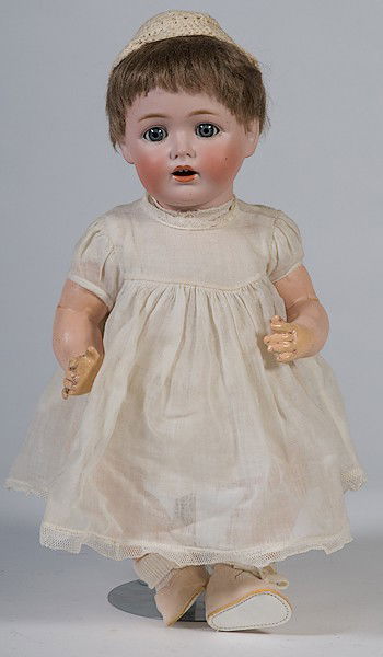 Kestner Doll : Kestner Doll Kestner doll with bisque socket head, marked J.D.K. 257, gray sleep eyes, flat brows, original baby mohair wig, five-piece Kestner baby body with original finish, with a crier; 14 in.