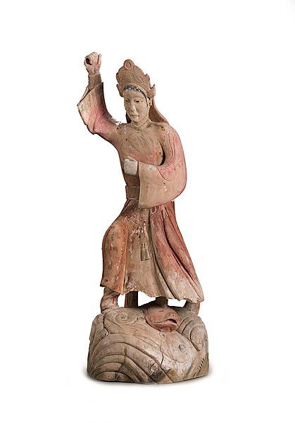Chinese Festival Carving of Lan Caihe : Chinese Festival Carving of Lan Caihe 19th century, mythological figure of Lan Caihe, one of the eight Taoist Immortals, standing on the back of a fish as she crosses the sea to visit the Queen Moth