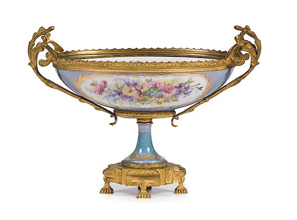 Sevres Ormolu Mounted Center Bowl : Sevres Ormolu Mounted Center Bowl French, 19th century. An ormolu mounted porcelain bowl with brass scroll handles and rim, hand-painted center cartouches depicting a courting scene and interior flo