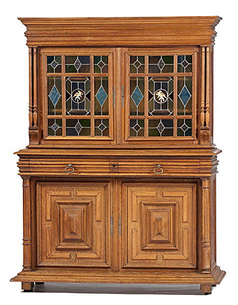 English Cupboard : English Cupboard English, late 19th century. A revival style cupboard in oak, with stepped cornice over two leaded glazed doors, over two drawers in in lower section frieze, over two architecturally