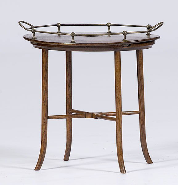 English Tray Table : English Tray Table Ca 1900, an oak tray with brass rail, center medallion and metal orb feet, resting on a (later) oak stand; ht. 18.5 in., wd. 21.5. in.