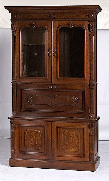 Fall Front Secretary Bookcase : Fall Front Secretary Bookcase American, third quarter 19th century. A fall front secretary bookcase in walnut with upper case having a molded cornice over two glazed doors over a fall front, enclosi
