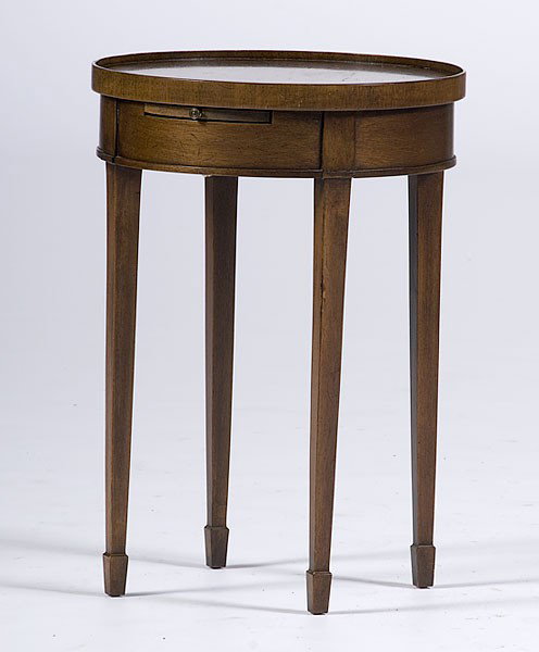 Hepplewhite-Style Candlestand : Hepplewhite-Style Candlestand 20th century, a round Hepplewhite-style candlestand in walnut, the top with raised edge over two pull-out candle slides, over tapered legs ending in spade feet; ht. 23.
